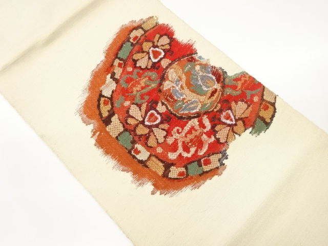 手織り紬丸文に蝶模様織出し名古屋帯